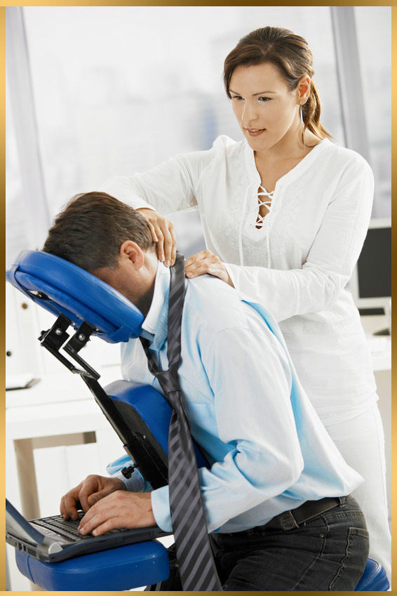 Businessman getting massage in office